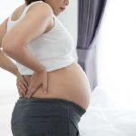 Bị thoái hóa cột sống khi mang thai phải làm sao?